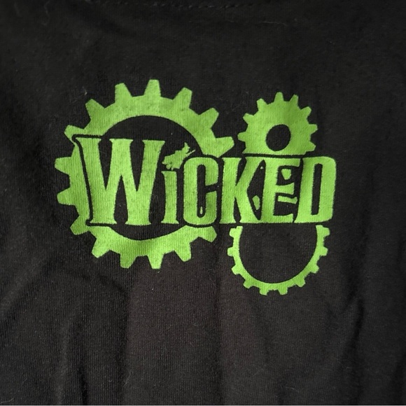 WICKED Elphaba Wear by Merch-Kin’s of OZ -Youth 4X =L Witch Faces on Black Shirt - Picture 2 of 9